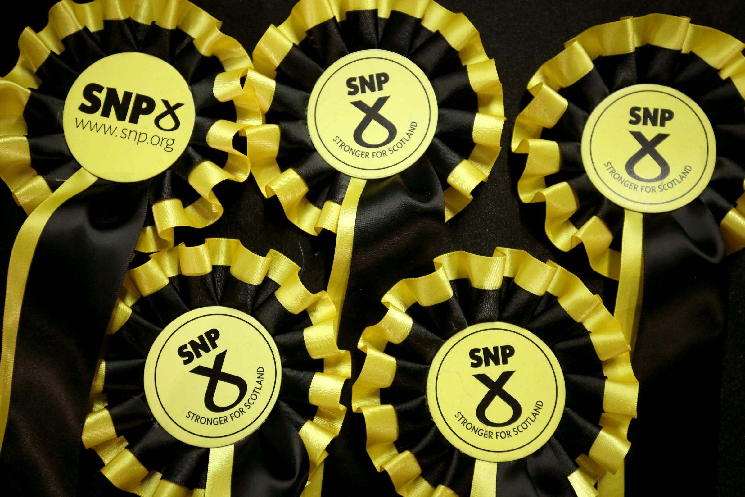 SNP ruling body proposes cutting HQ staff