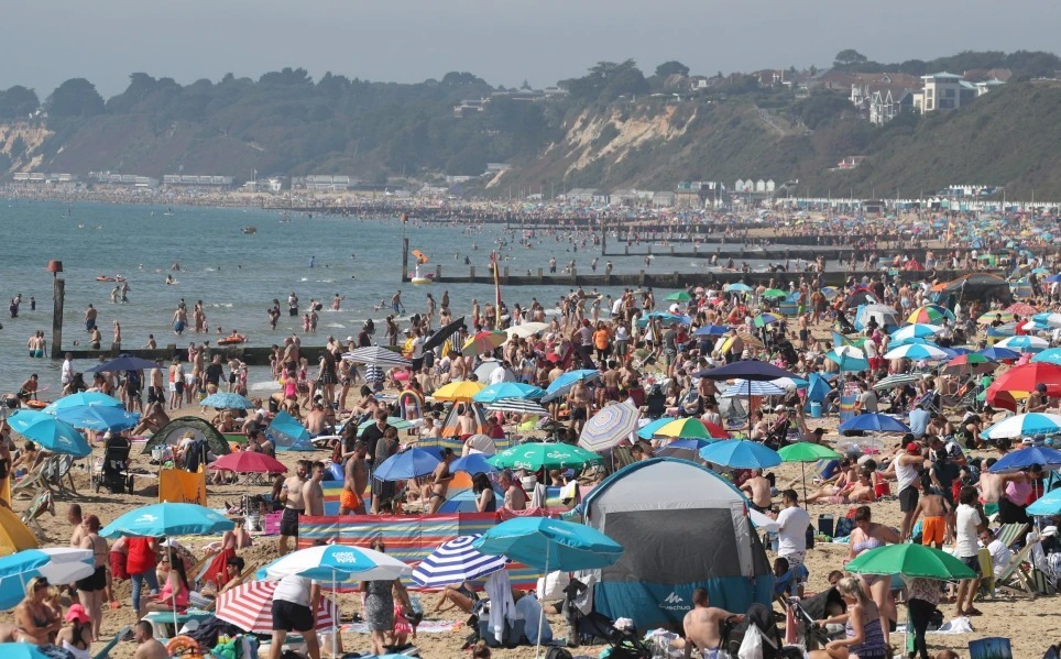 Bournemouth Beach - one of the many popular UK destinations during the summer. Credit: PA