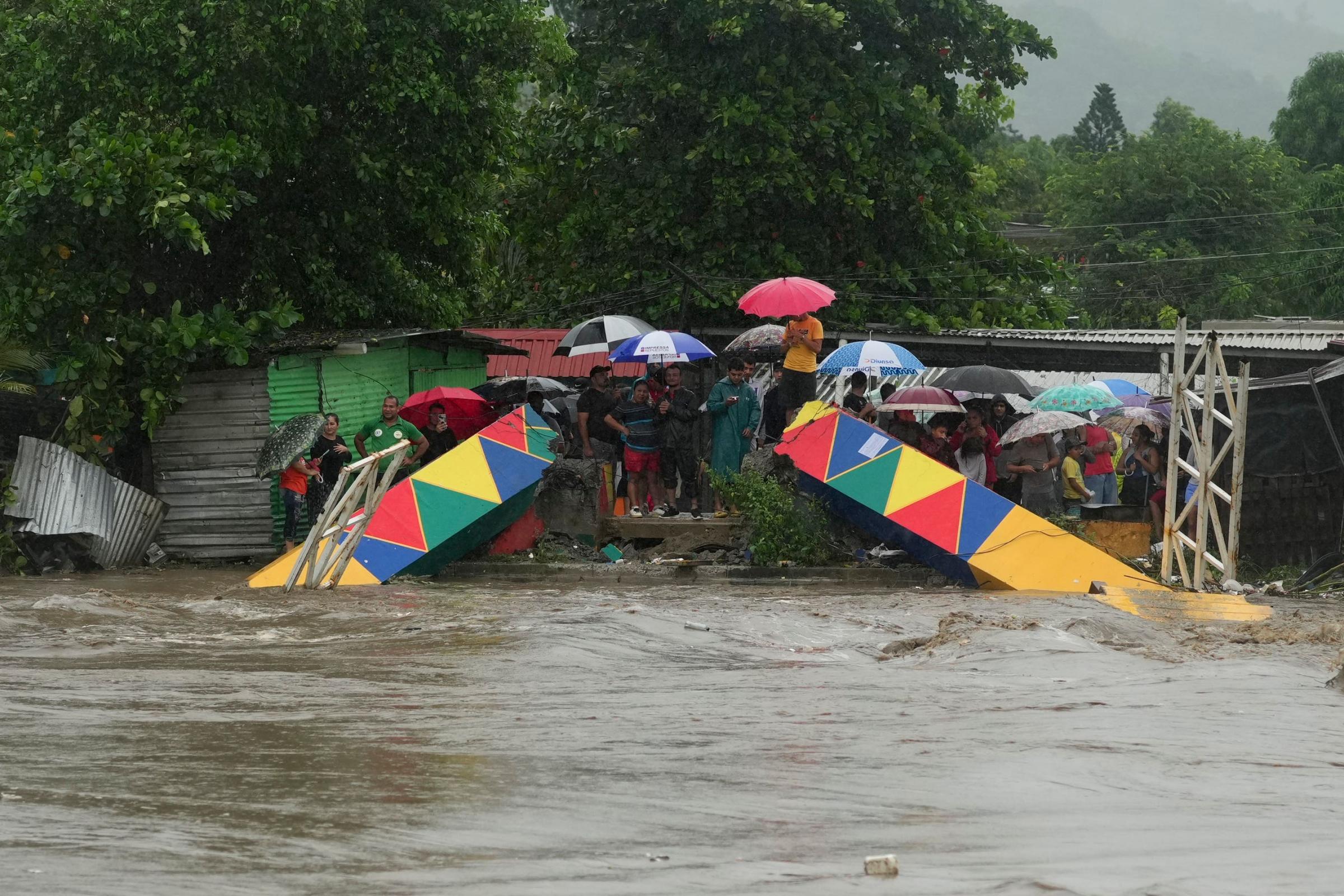 Flash floods and mudslides threat as tropical storm drenches Honduras