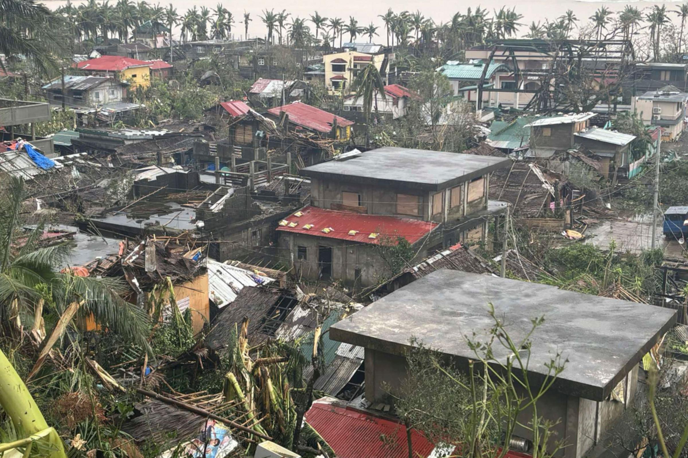 About 400,000 people displaced as latest typhoon batters the Philippines